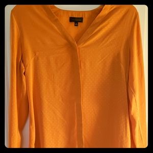 Orange button-down shirt with tie